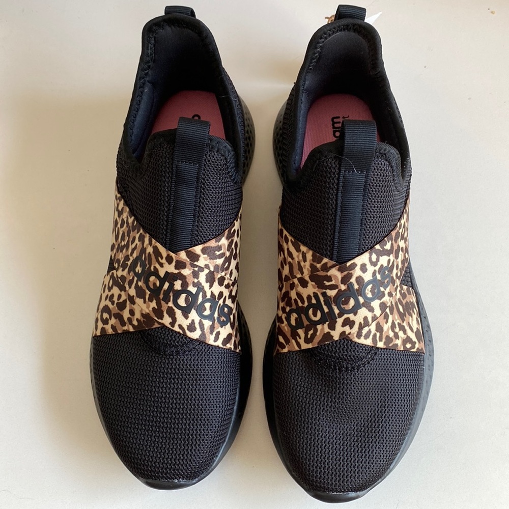 Adidas running shoes black with leopard stripes, never worn.